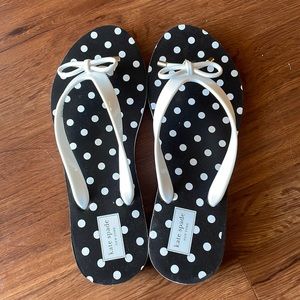 Brand new Kate side flip flops